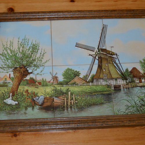 Tegelschilderij of Tegeltableau van is J.C. van Hunnik.